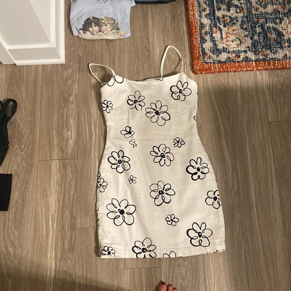 White dress with black flowers